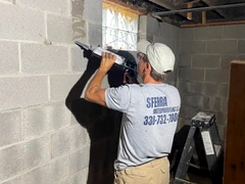 Carbon fiber reinforcement on basement block wall by Sferra Waterproofing