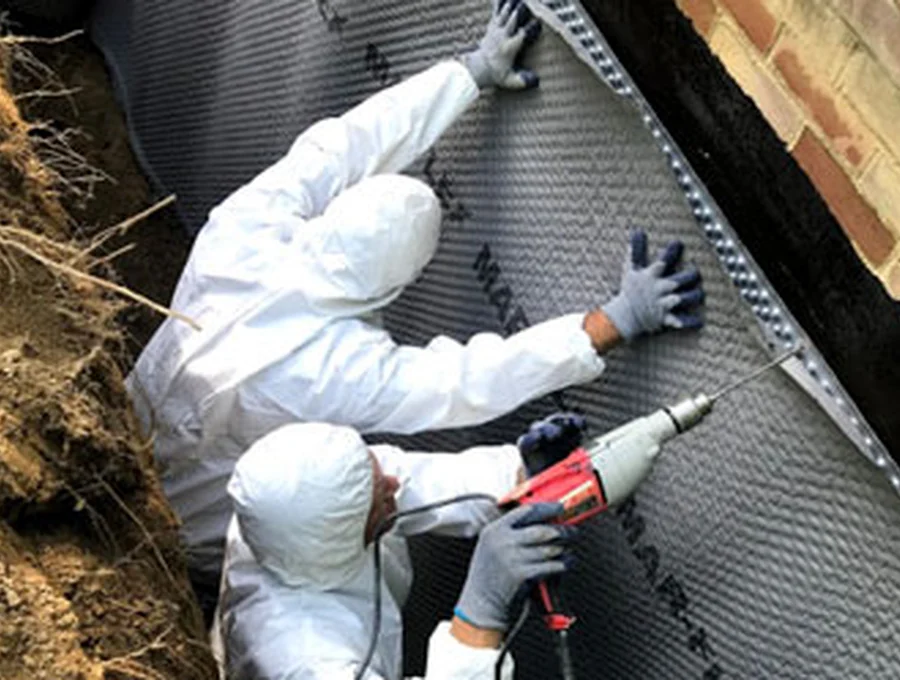 Exterior drainage mat installation by Sferra Waterproofing